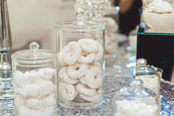 Wedding candy bar table. Cakes and other sweets