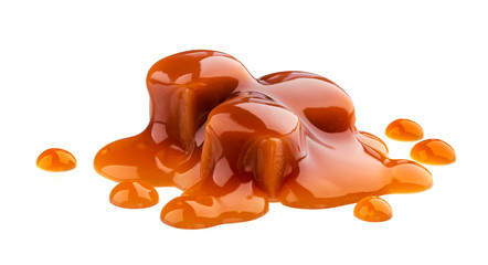 Caramel candies and caramel sauce isolated on white background