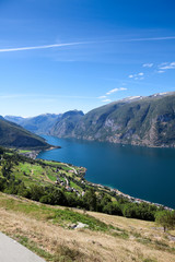 Fototapeta na wymiar Aurlandsfjord fjord in the Sogn og Fjordane county with mountain village Aurlandsvangen. Norway. Seen from route E16