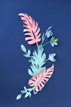 A modern handcraft paper origami with flowers and leaves cut fro