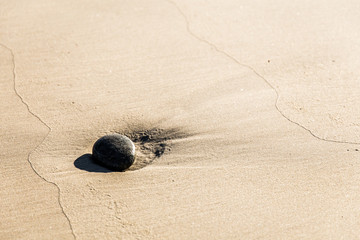 pebble in the sand