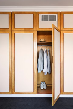 Vintage wardrobe with shirts inside