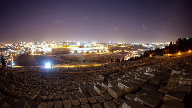 Time-lapse from the Mount of Olives overlooking the cemetery towards the Dome of the Rock at night.