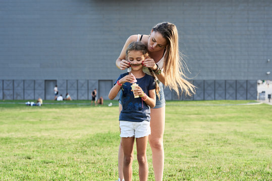 Sisters having fun at park.