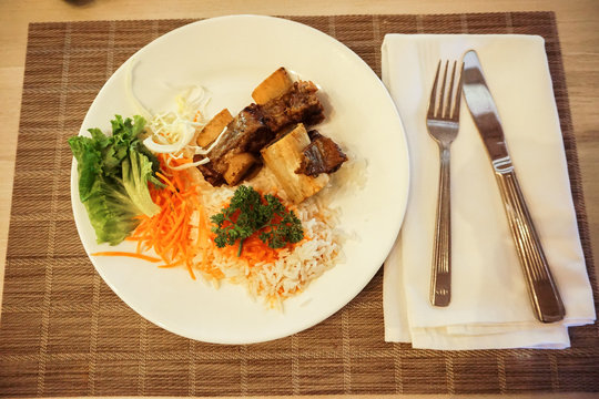 Rice lunch with meat and salad
