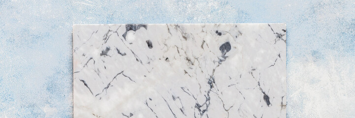 Marble Board on Blue Background