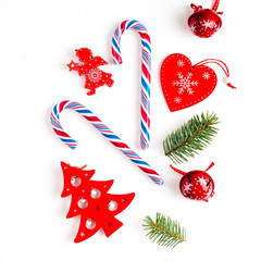 Red christmas decoration on whitebackground. Flat lay