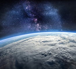 Outer space background. Orbit of the Earth planet. Stars and galaxies. Elements of this image furnished by NASA