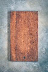 Old Chopping Board on Grey Background