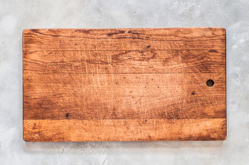 Old Chopping Board on Grey Background