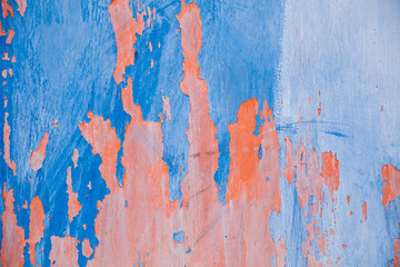 Abstract colorful wall texture and background. Close-up iron surface with old blue and pink paint