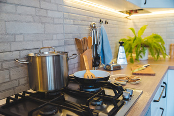 pan on stove with pancakes
