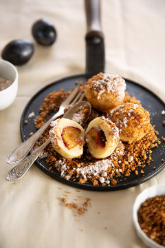 Potato plum dumplings with cinnamon sugar