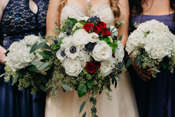 Bride and Bridesmaids Holding Bouquets