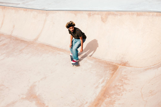 African-american teenager skating