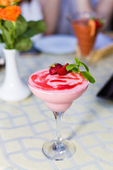 Fresh strawberry sugar dessert with ice cream and mint