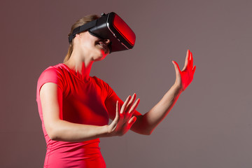 beautiful young woman wearing virtual reality glasses	