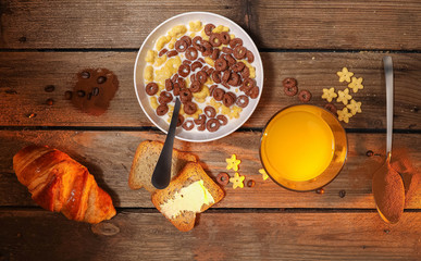 Top view of breakfast on rustic table