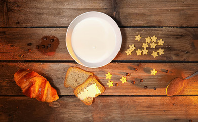 Delicious breakfast on a rustic table - top view