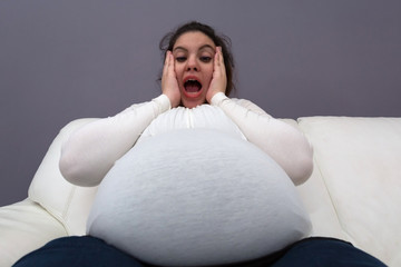 Extreme Angle View of Pregnant Mom’s Giant Baby Bump