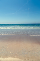 Fototapeta na wymiar Golden sandy beach filtered with copy space.