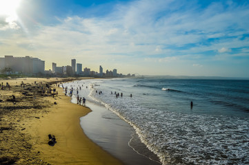 Durban golden mile beach with white sand and skyline South Africa