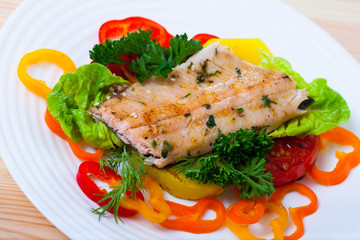 Delicious roasted juicy trout fillet