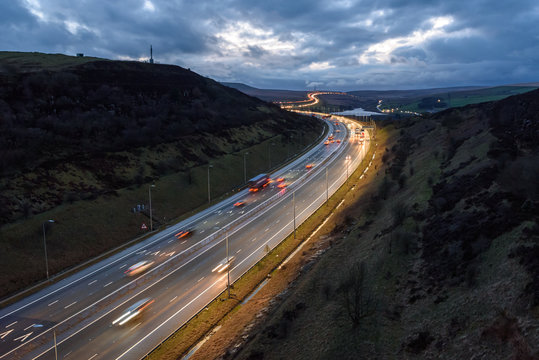 Light trails on M62 at night near Leeds, West Yorkshire, UK.