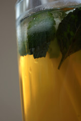Ice tea with mint in golden hour