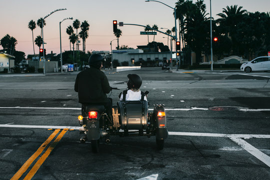 Young Anonymous Couple Riding Vintage Sidecar in Malibu