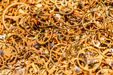 Mechanical watch repairing concept. closeup the parts of mechanical wristwatch.Detail of clock parts for restoration