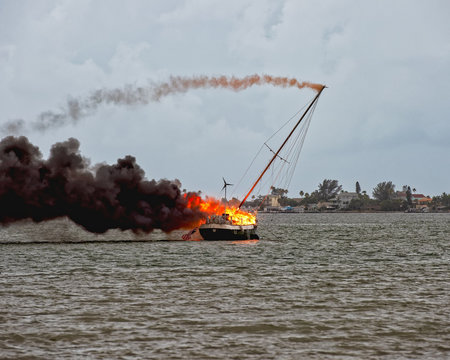Sailboat on fire — Mast is falling