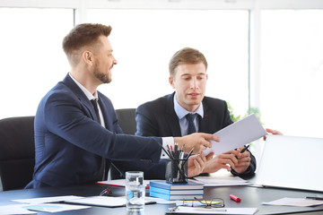 Team of business people during meeting in office