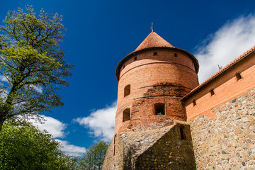 Trakai Island Castle in Lithuania, Eastern Europe. Tourists visit city castle. Famous ancient landmark