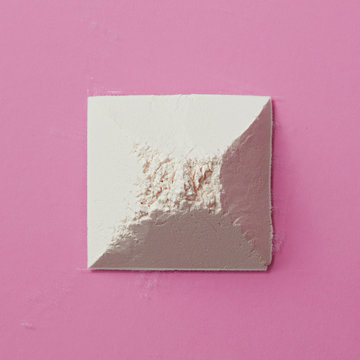 Pyramid made from flour isolated
