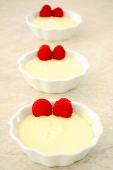 White chocolate custard with raspberries
