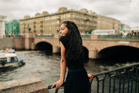 Portrait Of Happy Young Woman outdoors