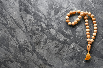 Muslim beads on grunge background
