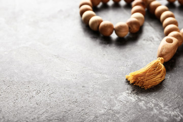 Muslim beads on grunge background
