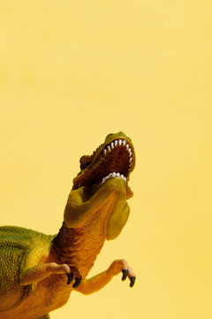 Screaming dinosaur toy in closeup