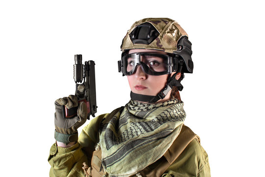 Portrait of young fully equipped military soldier woman holding a pistol, isolated photo.