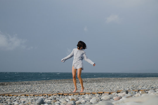 Windy seaside portrait