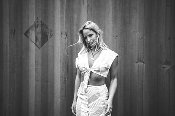Blonde Model Showing Midriff in a Croptop 