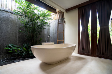 Luxury bathroom with bathtub in a villa, Ubud