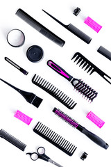 Set of professional hairdresser tools with combs and sciccors on white background top view pattern
