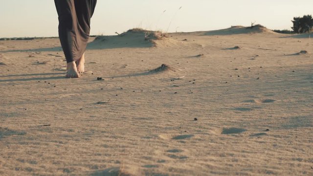 Step by step on a sand