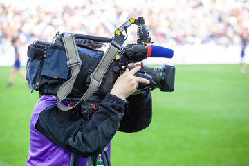 TV channel operators shoot a sport game