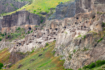 Fototapeta premium View of Vardzia caves. Vardzia is a cave monastery site in southern Georgia, excavated from the slopes of the Erusheti Mountain on the left bank of the Kura River