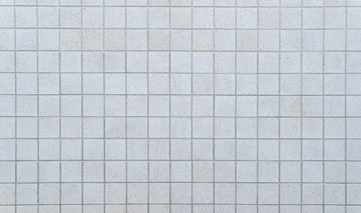 Cement pavement in the wall make square pattern. Background image.