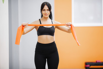 Fototapeta na wymiar Healthy lifestyle. Fitness woman doing exercise in gym
